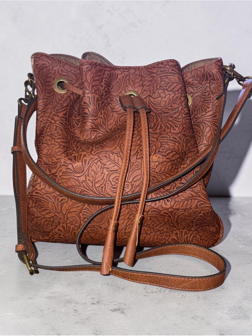 The Pioneer Woman tooled leaf faux leather bucket bag